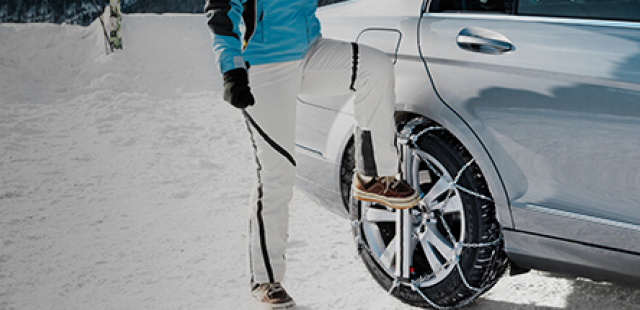 König Snow Chains on the wheel of a car